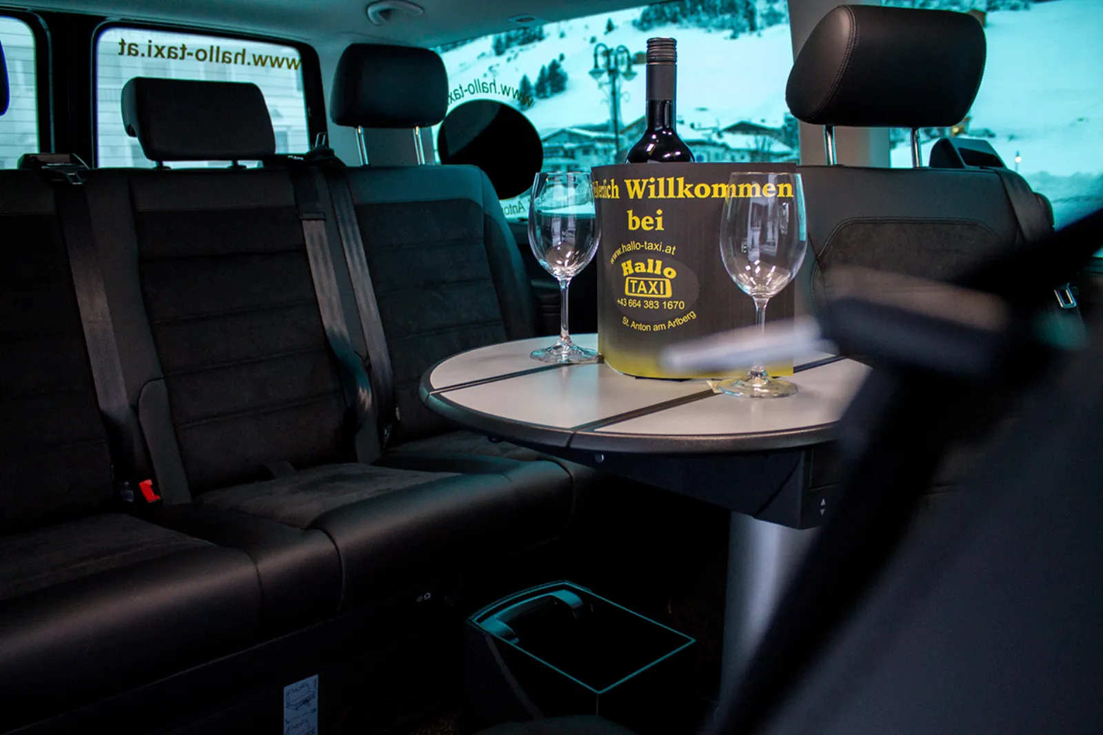 Comfortable interior of a Hallo Taxi transfer vehicle